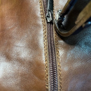 Замена замка молнии